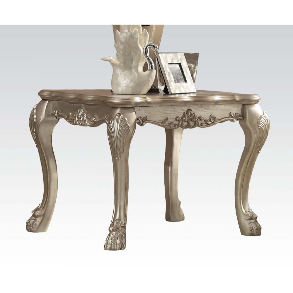 The Dresden traditional end table, reflects highly decorative details, oversized claw feet, decorative carving inlay veneers on apron, all carefully made with selected materials. This table will be the showpiece of any room environment.<br/><br/><b>Produc