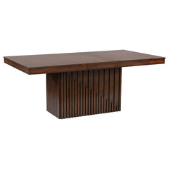 Robust design and superb styling pair beautifully in a modern wooden dining table. It includes an extension leaf ideal for everyday or occasional use, creating a larger table perfect for guests. The table is crafted with Asian hardwoods and receives a man