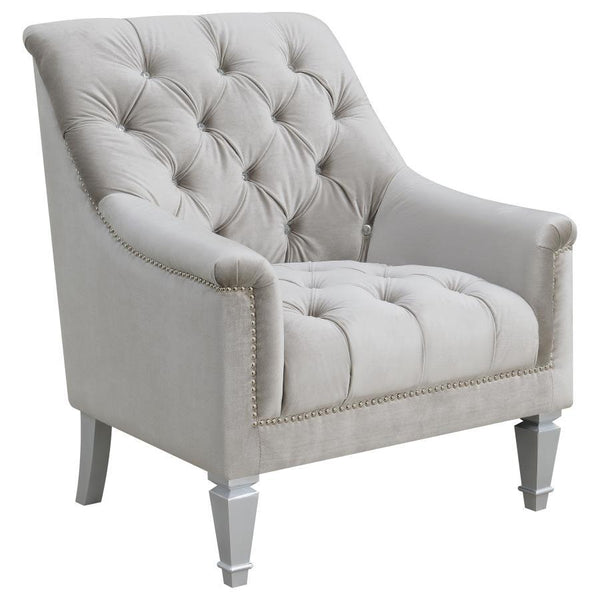 An armchair with polish as well as comfort makes for a splendid addition to any living room or family room. It features button-tufted craftsmanship for a timeless appeal. The high seat is slightly flared for leaning back in peace with perfectly-positioned