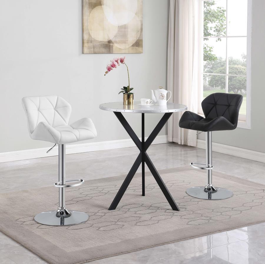 Add an industrial edge to your space with this round bar table, featuring a riveted silver top and bold X-shaped black base. This eye-catching bar table doubles as a statement piece and functional surface for casual dining or entertaining.<br/><br/><b>Pro