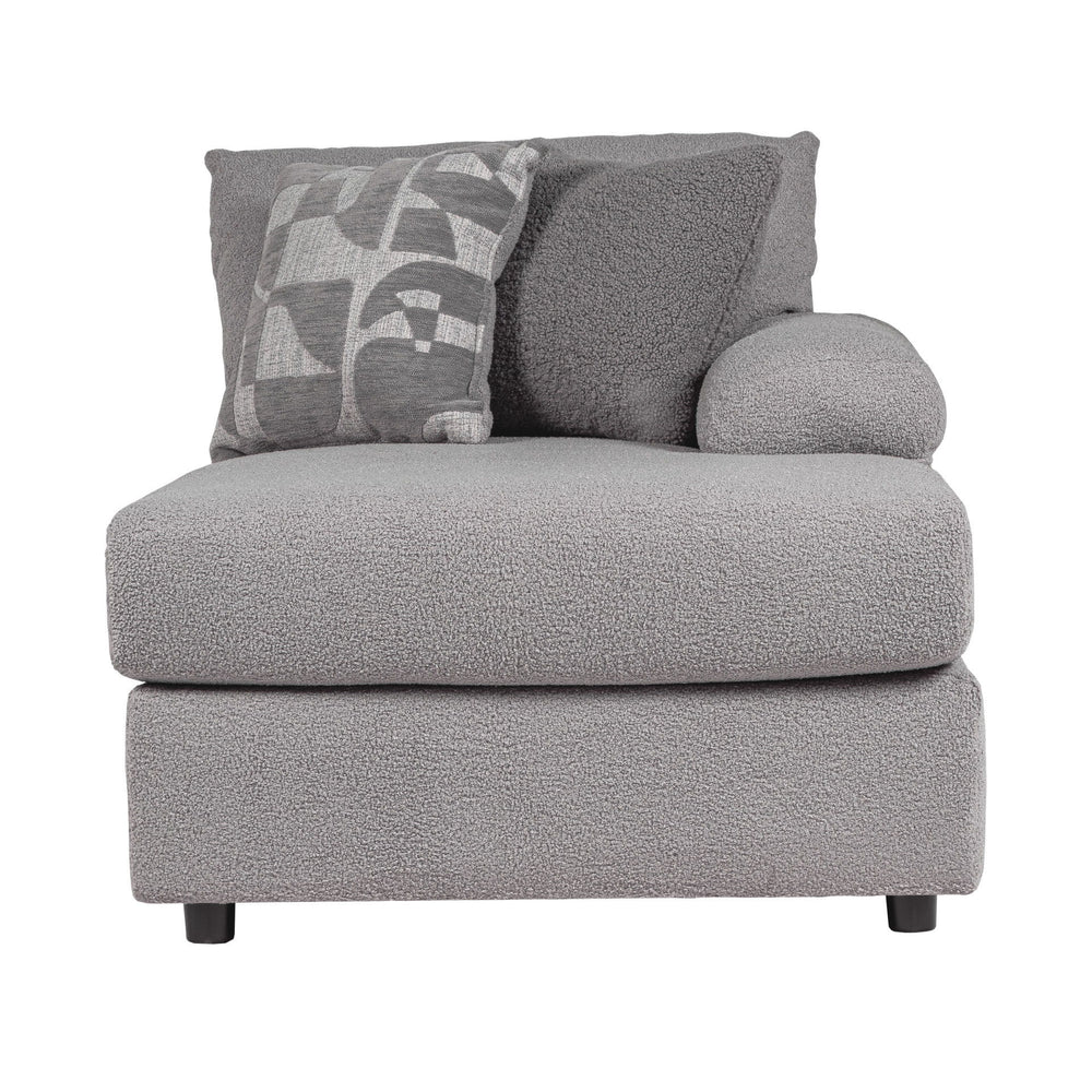 Introducing the Remi Right Arm Facing Chaise Lounge, a transitional marvel designed for those seeking comfort and style. This spacious lounger, boasting a roomy seat for three, is the perfect addition to your living space. Crafted in the USA, its solid an