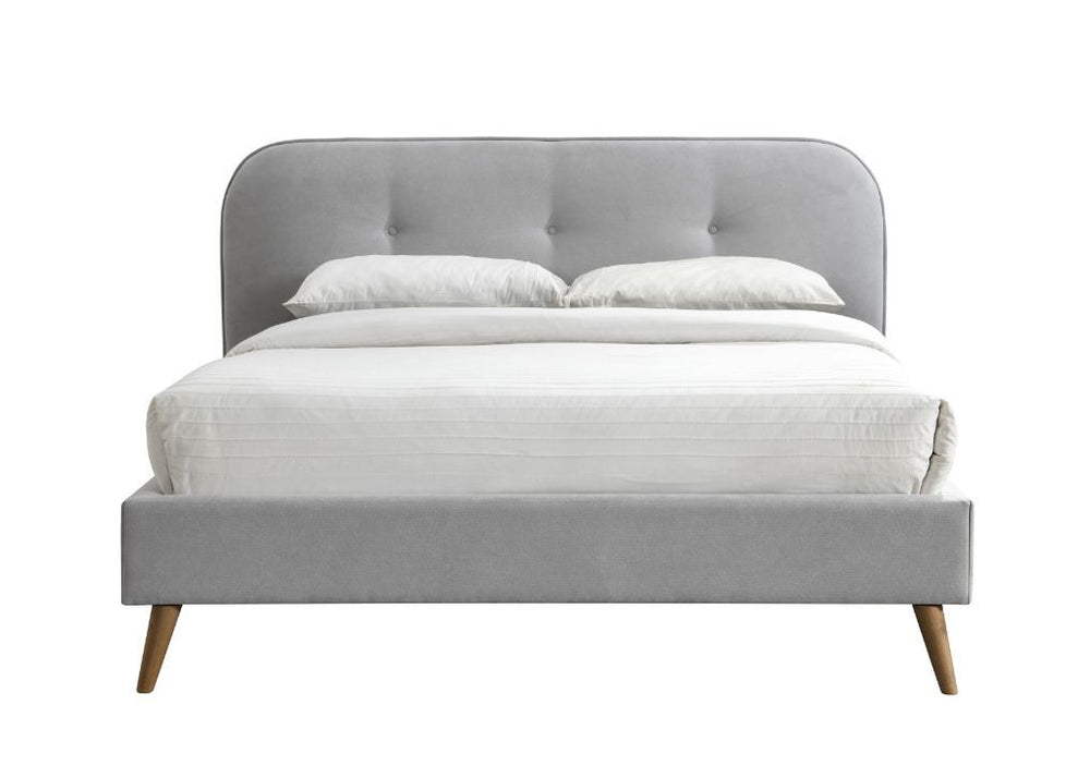 Unexpected gray tone paired with natural wood accents creates a relaxing sleep environment for you. The fully upholstered bed features a button-tufted headboard for a comfortable spot to lean on. Gray fabric upholstery fills the bed with a stunning textur