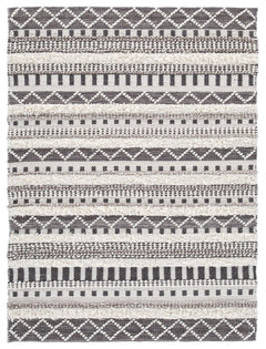 Stay on trend with tribal chic. This area rug is just neutral enough to work with your decor and just cool enough to keep your space hip. Decorate again and again on top of this dynamic floor covering