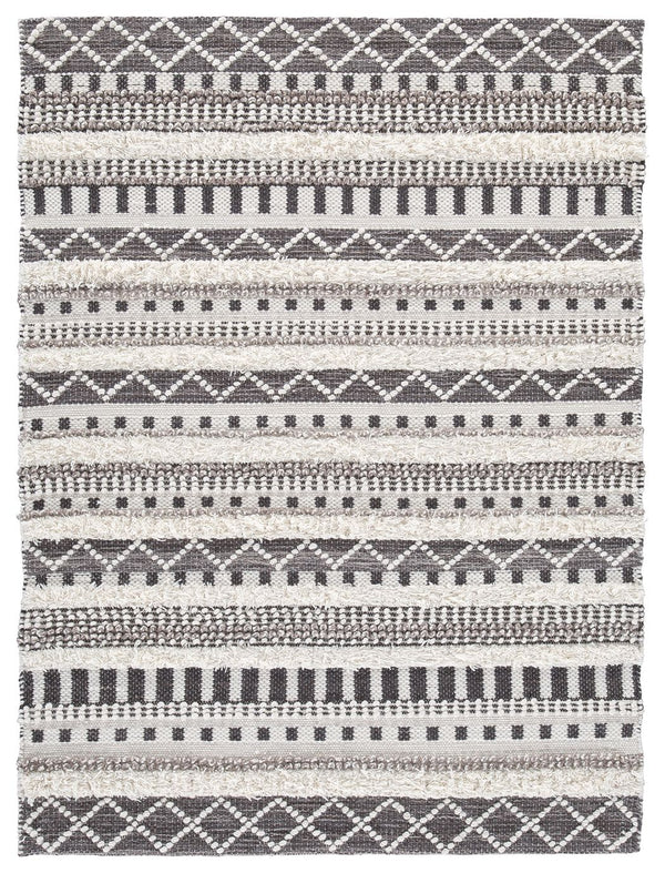 Stay on trend with tribal chic. This area rug is just neutral enough to work with your decor and just cool enough to keep your space hip. Decorate again and again on top of this dynamic floor covering