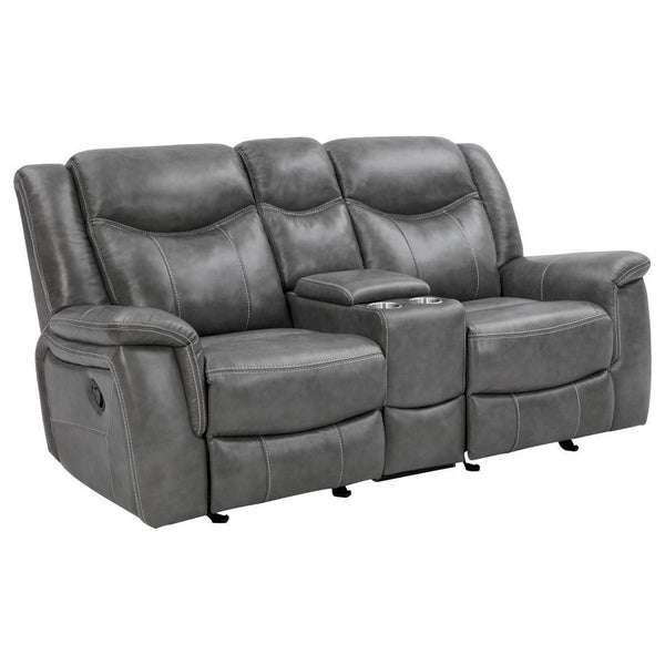 Grey is no longer drab and dreary and this decadent motion loveseat is proof. The angled seat backs feature extra padded headrests for optimal comfort. Padded armrests and recliner leg rest offer extra indulgence. Center console includes amenities like tw