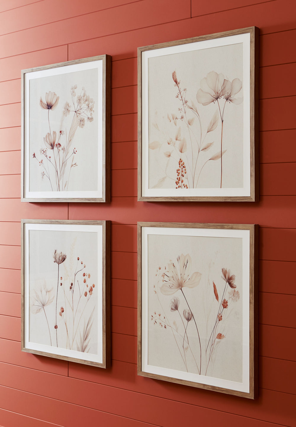 Add a touch of botanical charm to your surroundings. This wall art set showcases minimalist floral illustrations enclosed in glass and exquisitely framed. The chic collection celebrates the beauty of simplicity found in nature.<br/><br/><b>Product Feature