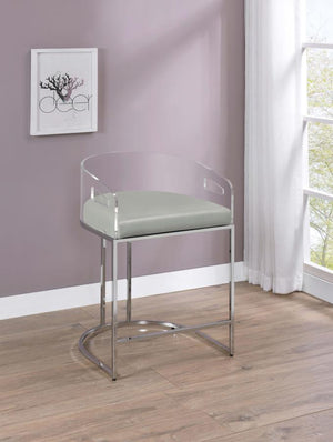  this pair of stools make a striking piece to a dining room space. With a curved backrest in a clear acrylic material