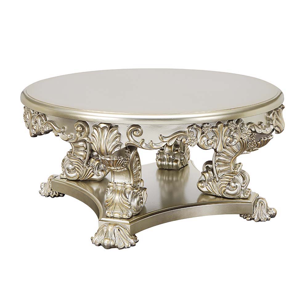 Traditional style that never goes out of fashion, the Sorina coffee table is a great addition to your living room. The silver and gold finishes complement each other flawlessly. This coffee table showcases elaborate carvings on the table base to recreate 