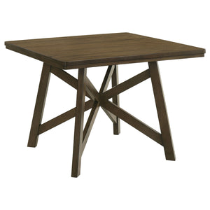 Elevate your dining space with this 47-inch square counter height dining table, perfect for creating a cozy yet stylish dining area. Crafted with engineered wood, hardwoods, and finished with a beautiful mindi veneer, this table showcases natural wood str
