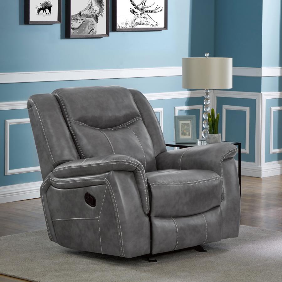 Grey is in and it looks no cooler than on this motion glider recliner. This indulgent recliner features a sumptuously padded headrest to lay your head in comfort. Both armrests and seat cushion are overstuffed for long-lasting comfort. Simple and ergonomi