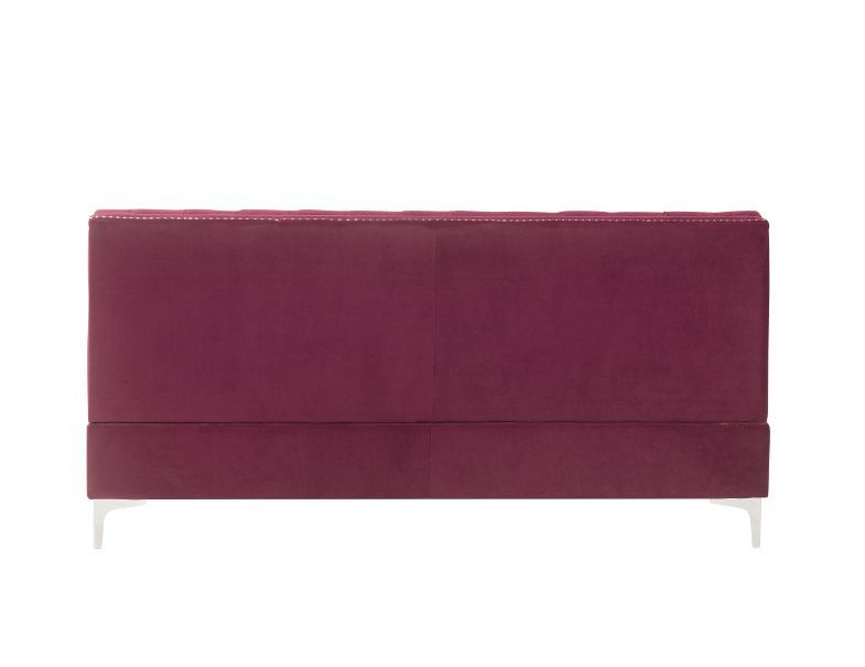 Nothing screams luxury like this Jaszira modular upholstery group. Each piece is enveloped in a luxurious velvet upholstery and showcasing button tufting, and a nail head trim accent for a tailored touch. Foam padding offers comfortable cushioning. Design