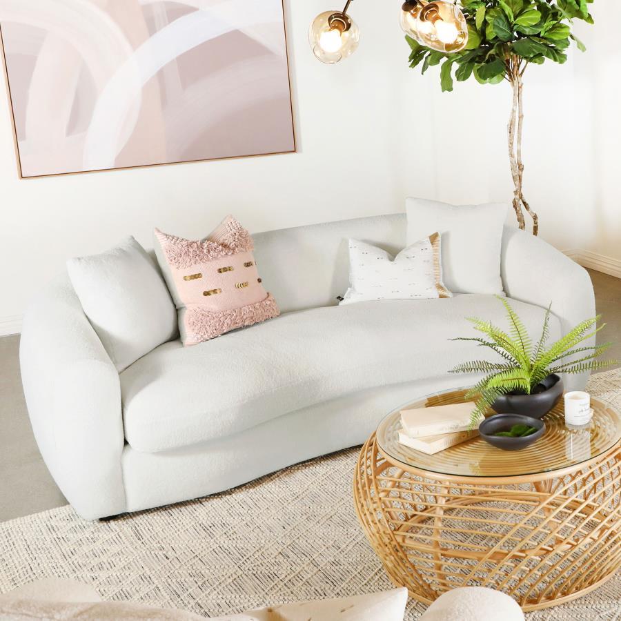 Create your inviting living room with this contemporary natural sofa, upholstered in boucle upholstery throughout its gracefully designed, contoured silhouette and elegantly sloped armrests. Matching accent pillows with premium faux down fill offer extra 