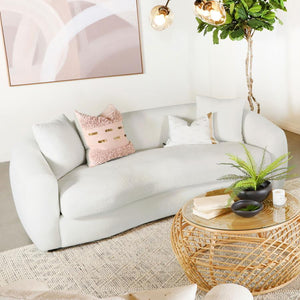  upholstered in boucle upholstery throughout its gracefully designed