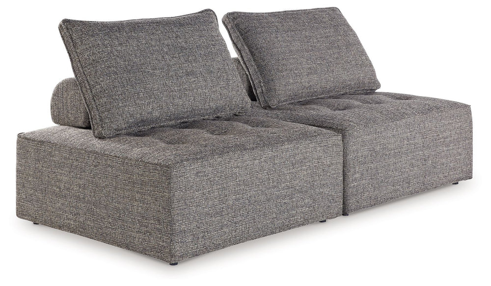 This sectional seeks to bring serenity to your outdoor seating area. Channeling Japandi and casual contemporary aesthetics, its low profile encourages laid-back living without sacrificing sophistication. The included back cushions complete moments of tran