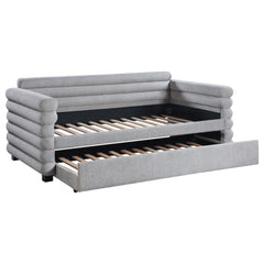You-'re going to love the intriguing silhouette and boucle upholstery featured on this modern daybed and trundle. Offering contemporary flair, the daybed is designed with layered round bolsters, creating exceptional texture and dimensionality in your livi
