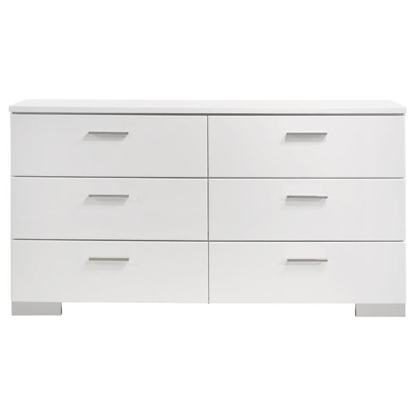  while chrome-finished metal handles and feet add refined contrast. Each drawer glides smoothly on metal 