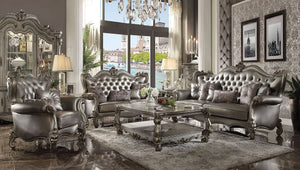 The Versailles collection with antique platinum finish will create you an elegant, warm and traditional taste in your living room. The sofa set reflects highly decorative base with scrolled feet, and the upholstered seats with the deep button tufted and N
