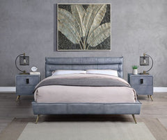 Masculine yet soft, the Doris bedroom collection is edgy and inviting all in one. The leather upholstered bed can fit with an industrial, vintage, or modern bedroom easily. The headboard features horizontal channel tufting to adds some support while leani