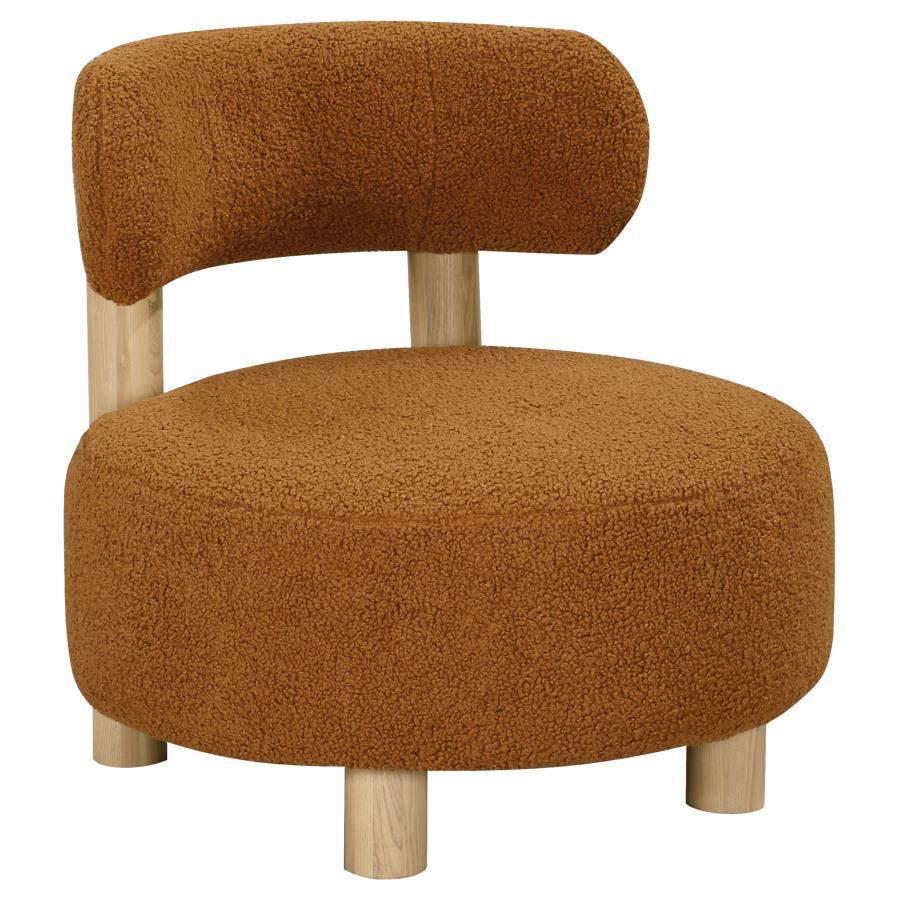 Play with proportionality with the intriguing silhouette of this modern accent armchair. Designed to make a statement in your living area, it boasts thick, plush boucle upholster that sets a trendy ambiance. The chair shows off a low profile, complete wit