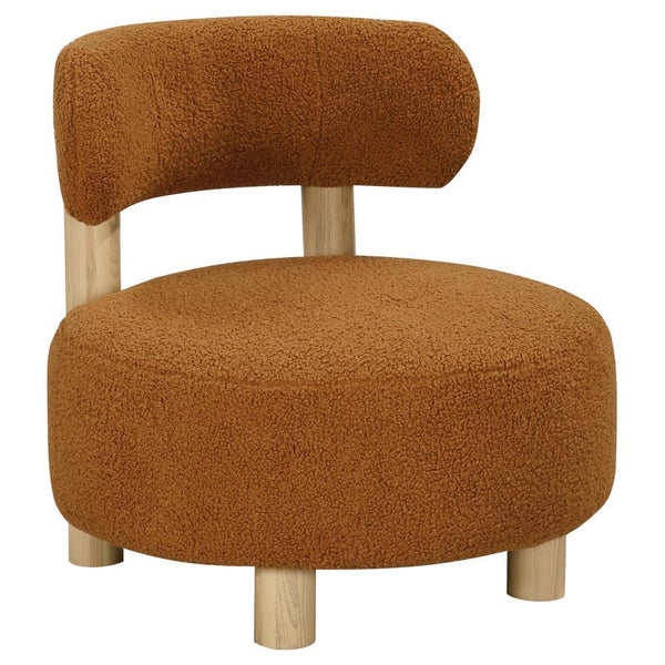 Play with proportionality with the intriguing silhouette of this modern accent armchair. Designed to make a statement in your living area, it boasts thick, plush boucle upholster that sets a trendy ambiance. The chair shows off a low profile, complete wit