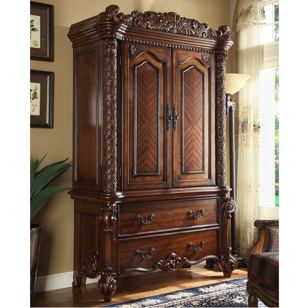 Create an elegant, traditional design in your bedroom with the cherry Vendome TV Armoire. This hand-crafted piece inspired from the luxurious designs of the past, this TV Armoire features elaborate wood carving details, traditional hardware and a sophisti