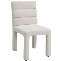 Hettie collection side chair enveloped in luxurious beige boucle, exudes timeless elegance and comfort. Its structured design and plush upholstery make it an ideal addition to any dining or living space. This chair not only provides a chic seating option 