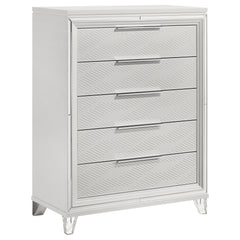 Maximize your bedroom storage with this stylish 5-drawer chest, featuring a modern Italian design. The white finish and picture framed recessed panels with embossed herringbone graphic patterns create a sophisticated look. Accented with mirror framing, ac