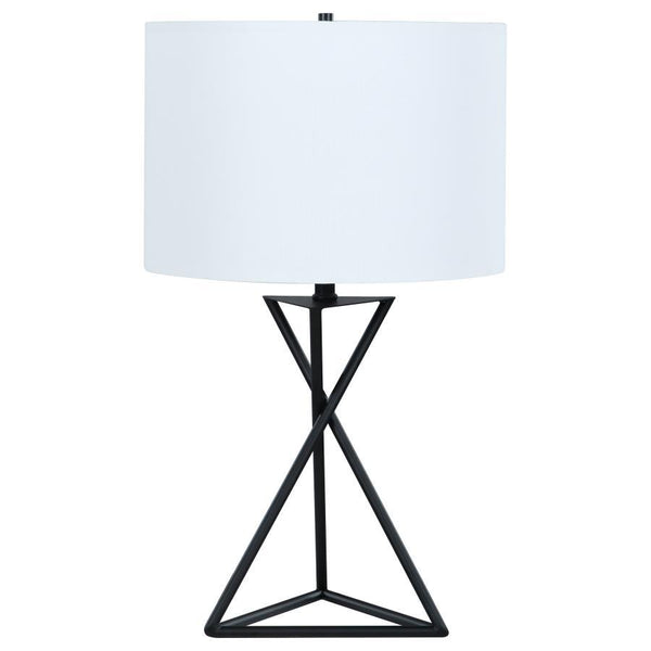 Enhance your sanctuary with this elegant bedside table lamp, a beacon of ambient lighting that radiates modern charm. Its drum shade casts a soft, inviting glow, perfect for unwinding in your personal retreat. The geometric base adds a touch of contempora