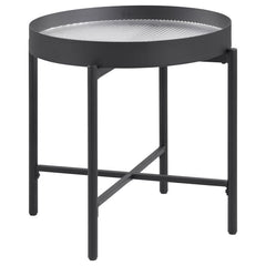 This elegant accent table invites modern style into your living room. With a sleek metal frame in a sandy black powder coated finish and a tempered reeded glass top, it effortlessly transforms into an occasional table or utility table. Whether placed besi
