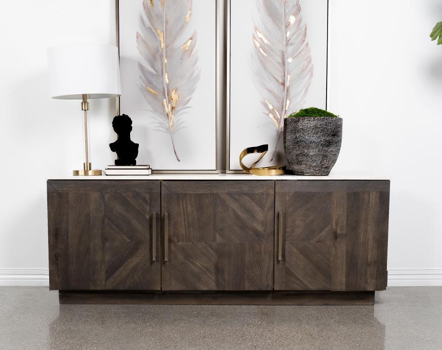 Take entertaining to the next level with the impressive style and storage presented in this contemporary server. Three doors open to reveal interiors shelving to house all manner of serve ware, linens, and other necessities. Door fronts are beautifully cr