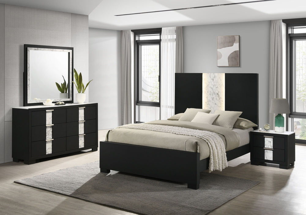 This bedroom set epitomizes modern luxury with its bold, black finish and striking contrast detailing. The bedâ€™s commanding headboard features a chic marble-like accent and integrated lighting, creating an opulent focal point in the room. Complementary 