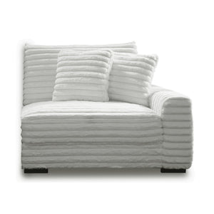 The Embrace Right Arm Facing Chair with 2 Accent Pillows in white is a sophisticated and comfortable addition to your sectional arrangement. Featuring 100% white polyester fabric with a fluffy, blanket-like texture, this chair promises ultimate relaxation