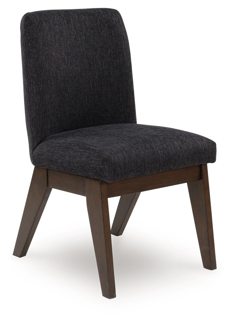 Casual contemporary styling with a decidedly modern vibe. Sitting atop a mid-century inspired base, this upholstered bucket dining chair has a rich warm brown finish that beckons everyone to gather around. Black textured upholstery dresses the chair in on