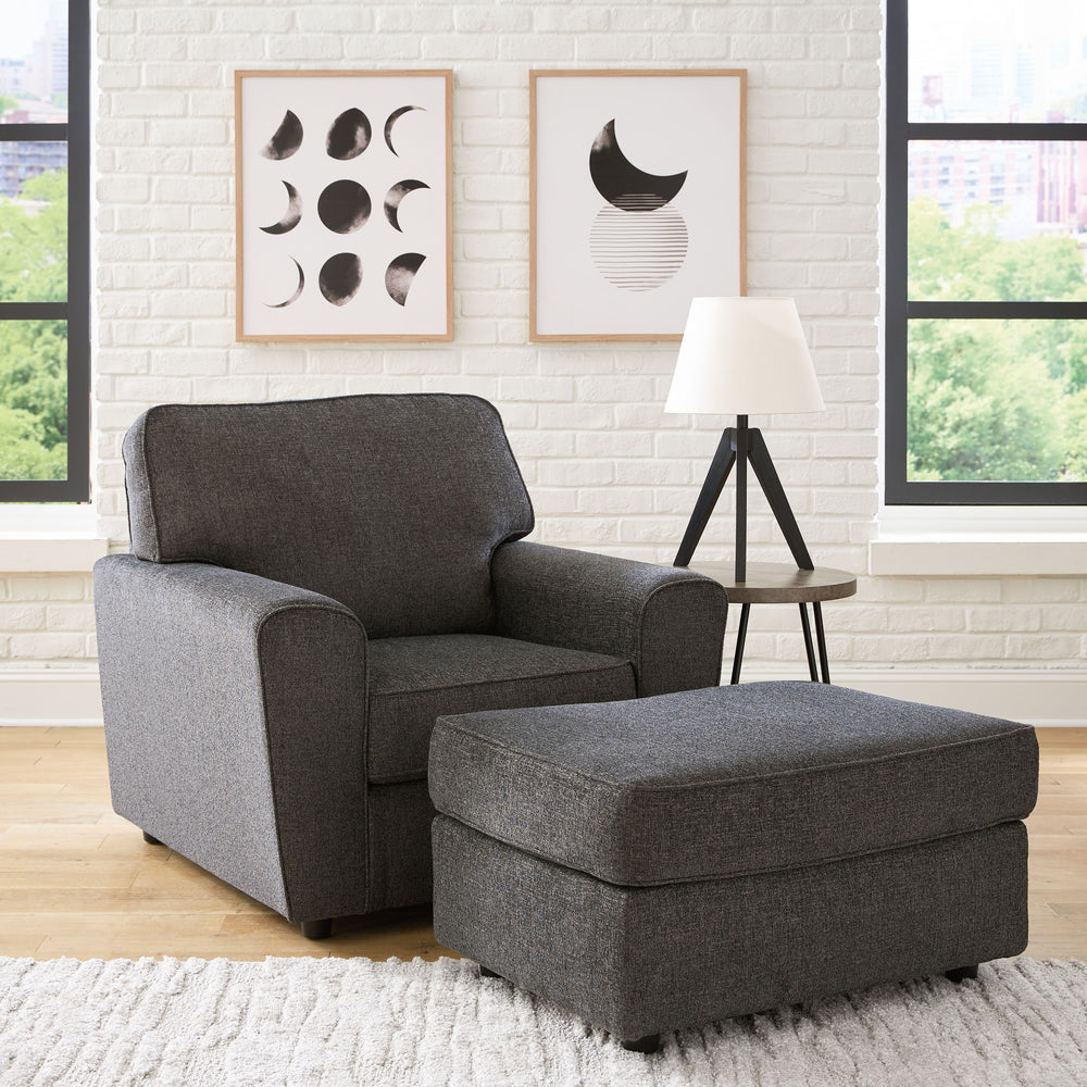 Revamp your sleekly styled living room sanctuary with this chair and ottoman. Well-suited to contemporary spaces with a calming neutral upholstery in slate gray, it makes a subtle design statement in your space whether youâ€™re hosting guests or enjoying 