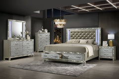 Experience luxury and functionality with the Radiance King 5-Piece Bedroom Set. Crafted with a blend of Solid Rubberwood and manufactured woods, this set offers unparalleled stability and durability. The semi-gloss lacquer Platinum Silver finish adds a mo