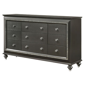 The Kaitlyn dresser provides a commanding presence in any room. Crafted with a transitional look that is an ideal addition to any bedroom, the dresser is accented with textured front and a crystal-like sparkling trim. Its crystal-like trimming creates daz