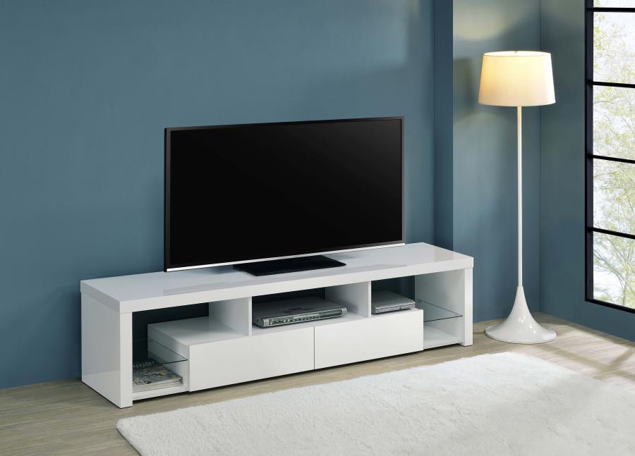 Elevate your entertainment realm with our sleek, modern TV stand. With a pristine glossy white finish and clear glass accents, it exudes elegance. Beyond looks, it-'s the epitome of functionality. Soft-close drawers glide effortlessly, housing your gadget