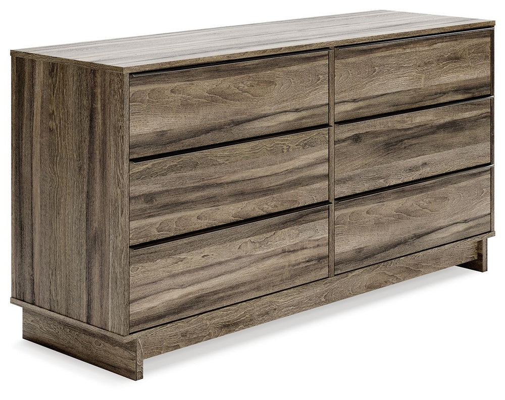 Your modern sanctuary is within reach. The subtle design of this dresser is accented with a low profile base. Its weathered brown finish is complemented with refined champagne-colored handles on the six smooth-gliding drawers.<br><br><b>Additional Dimensi