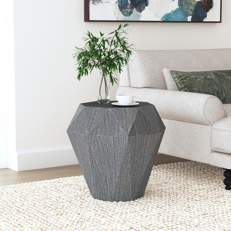 Inspired design meets exceptional craftsmanship in a modern wood side table. This dynamic design is influenced by the classic cut of a sparkling gemstone, offering faceted elegance and refinement. Made from wood that adds earthy character, the table is a 