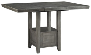 Cool and on-trend. This counter height extension table sports an antiqued gray color for a contemporary-yet-casual feel. The table features a storage base and removable leaf for extra seating room, making it a breeze to clear off clutter and expand your t
