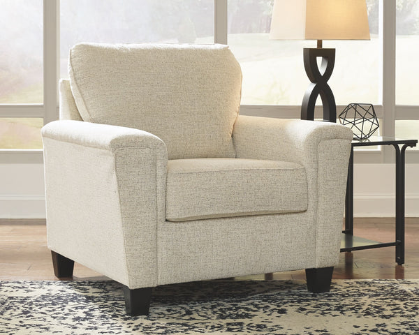  budget-conscious living room set a breath of fresh air. Covered in a cream-tone chenille upholstery loaded with plush texture