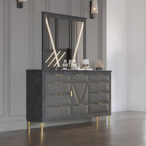 Enhance your space with the Symmetry 2-Piece Dresser & Mirror Set - Gray. Crafted from premium woods with a gray marble laminate, this set exudes timeless elegance. Gold metal and mylar accents add a glamorous touch, while English dovetail drawers ensure 