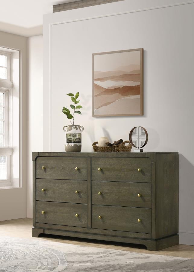 Add a touch of elegance to your bedroom with this spacious dresser, featuring a transitional design with rounded corners and trending details. The dark cocoa finish and brass knobs complement the sophisticated style, while the solid wood drawer box with E