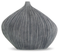 Sculptural in form, simply stunning in function. This vase captures the eye with its asymmetrical, curved shape. Itâ€™s an ideal accessory for your curated approach to casual design.<br/><br/><b>Product Features</b><ul><li>Made with polyresin</li><li>Anti