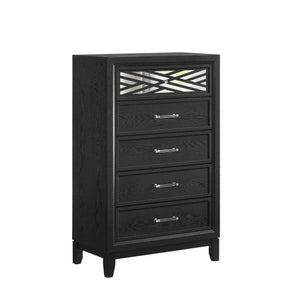 The Obsidian 5-Drawer Chest in Black is a sophisticated piece that combines modern elegance with practical functionality. Expertly crafted from premium solid Rubberwood and enhanced with manufactured woods and veneers, this chest offers both lasting beaut