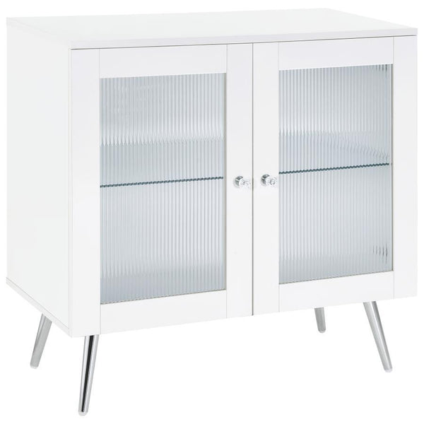 Step into a world where classic charm meets modern elegance with this 2-door accent cabinet. The crisp white finish on engineered wood construction is beautifully complemented by the textural contrast of rippled doors. Tapered steel legs, electroplated in