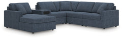 Looking cool and contemporary is great. But when it comes down to it, youâ€™re all about low-maintenance lounging. With the performance fabric on this sectional with audio system, cleaning spills is a breeze. Its customizable modular design caters to your