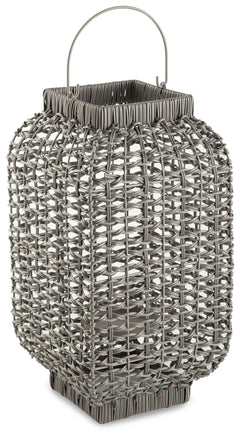 Complete the look of your restful retreat with this homey lantern. Its antiqued gray faux rattan filters the light of your candle (not included) to give a gentle glow to your space. When not in use, this chic indoor/outdoor piece rounds out your decor wit