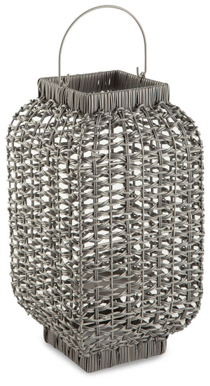 Complete the look of your restful retreat with this homey lantern. Its antiqued gray faux rattan filters the light of your candle (not included) to give a gentle glow to your space. When not in use, this chic indoor/outdoor piece rounds out your decor wit