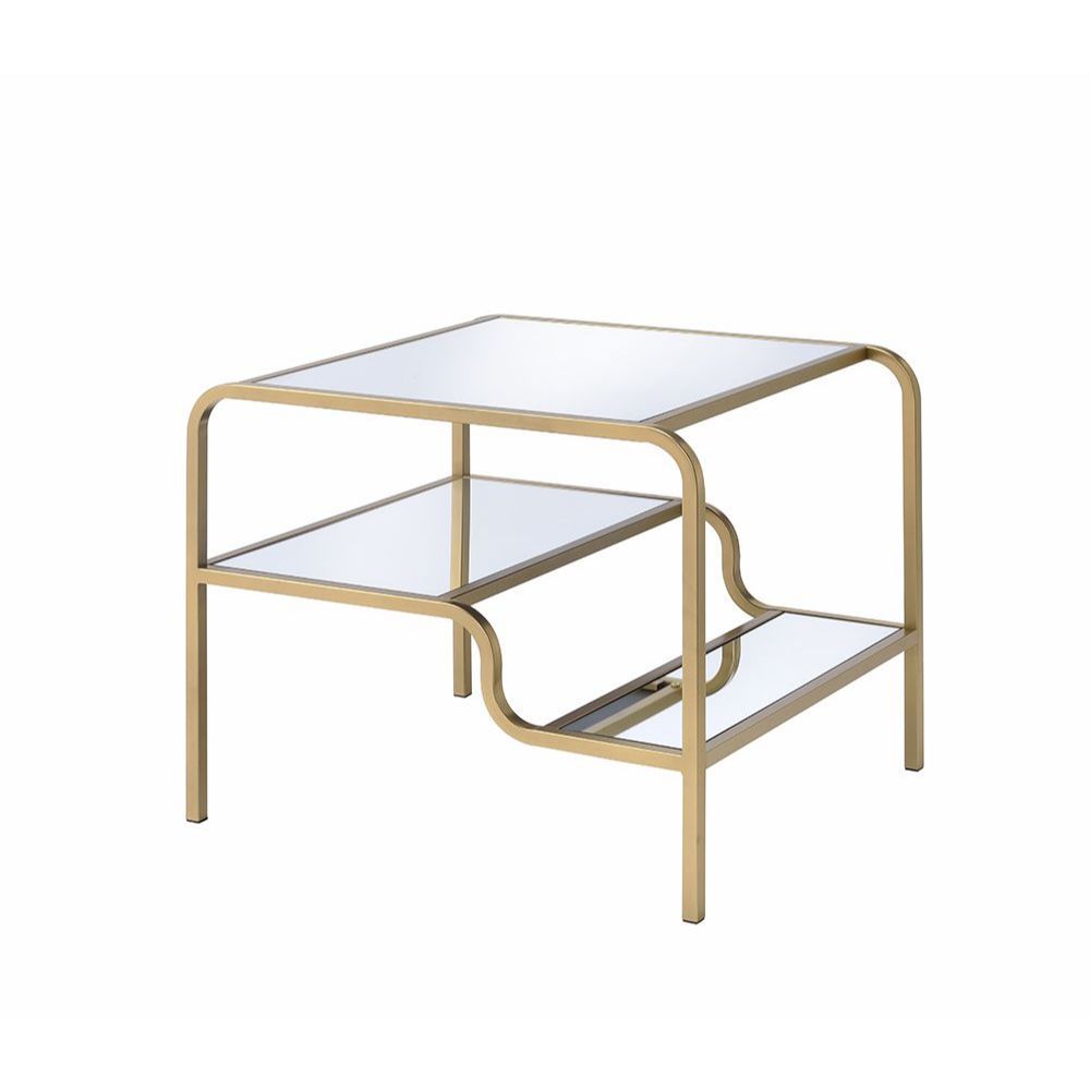Center your seating arrangement around a sleek and sophisticated style with the Astrid occasional collection. Inspired by timeless materials, it features a mirror top with a stylish curving frame made of refined gold metal coating. An open base and floati